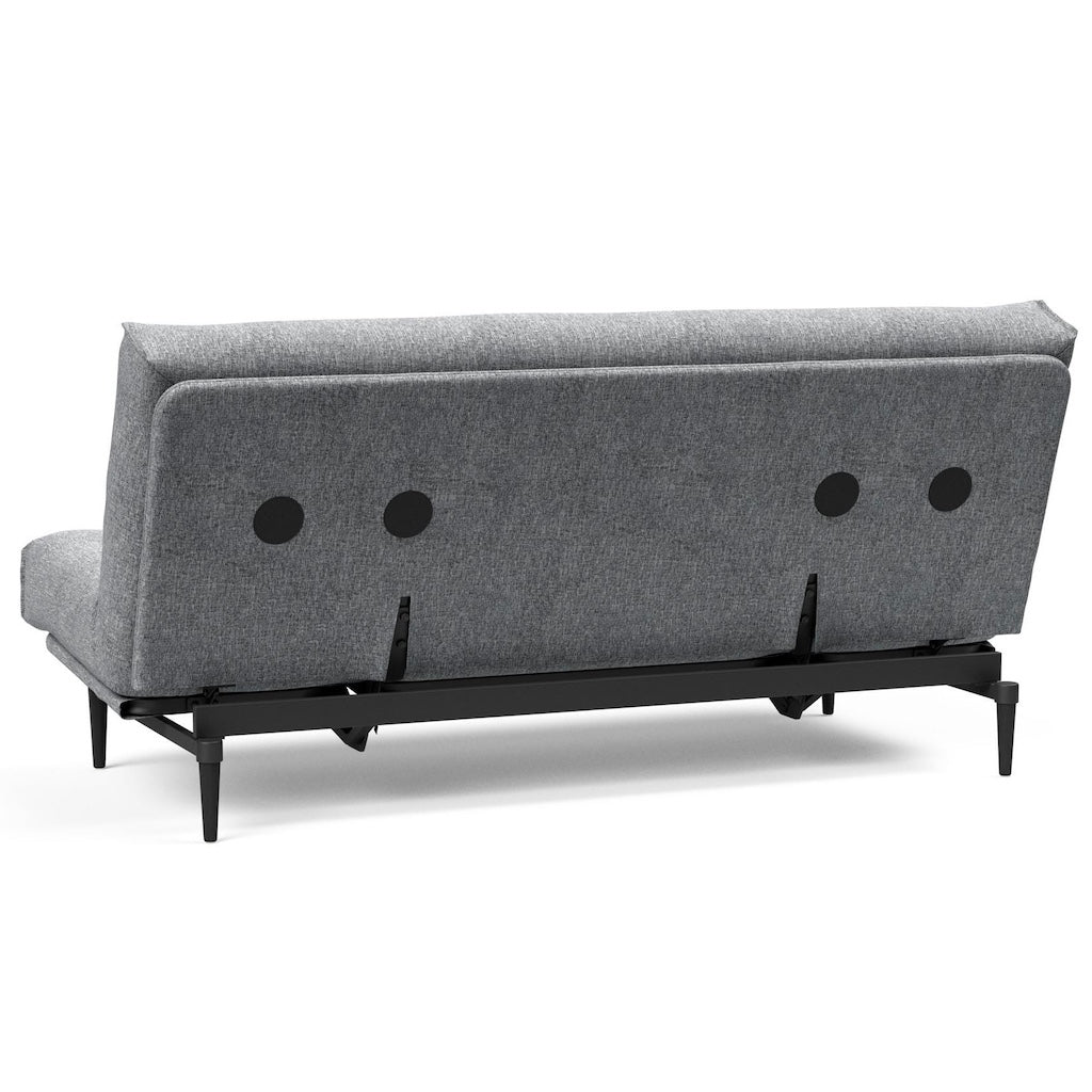 Colpus vuodesohva, jalat mustat, kangas Twist Granite. Kuvassa mukana myös erikseen tilattava rungon istuinosan suojus.