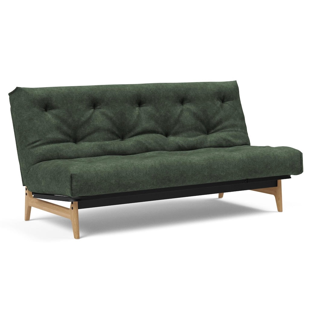 Aslak vuodesohva, kangas Avella Pine Green.