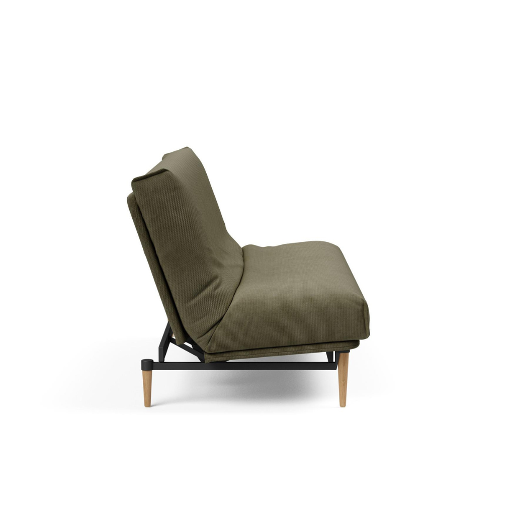Colpus vuodesohva irtopäällisillä, kangas Cordufine Pine Green. Kuvassa sohvan patjan päälle on puettu Nordic irtopäällinen.