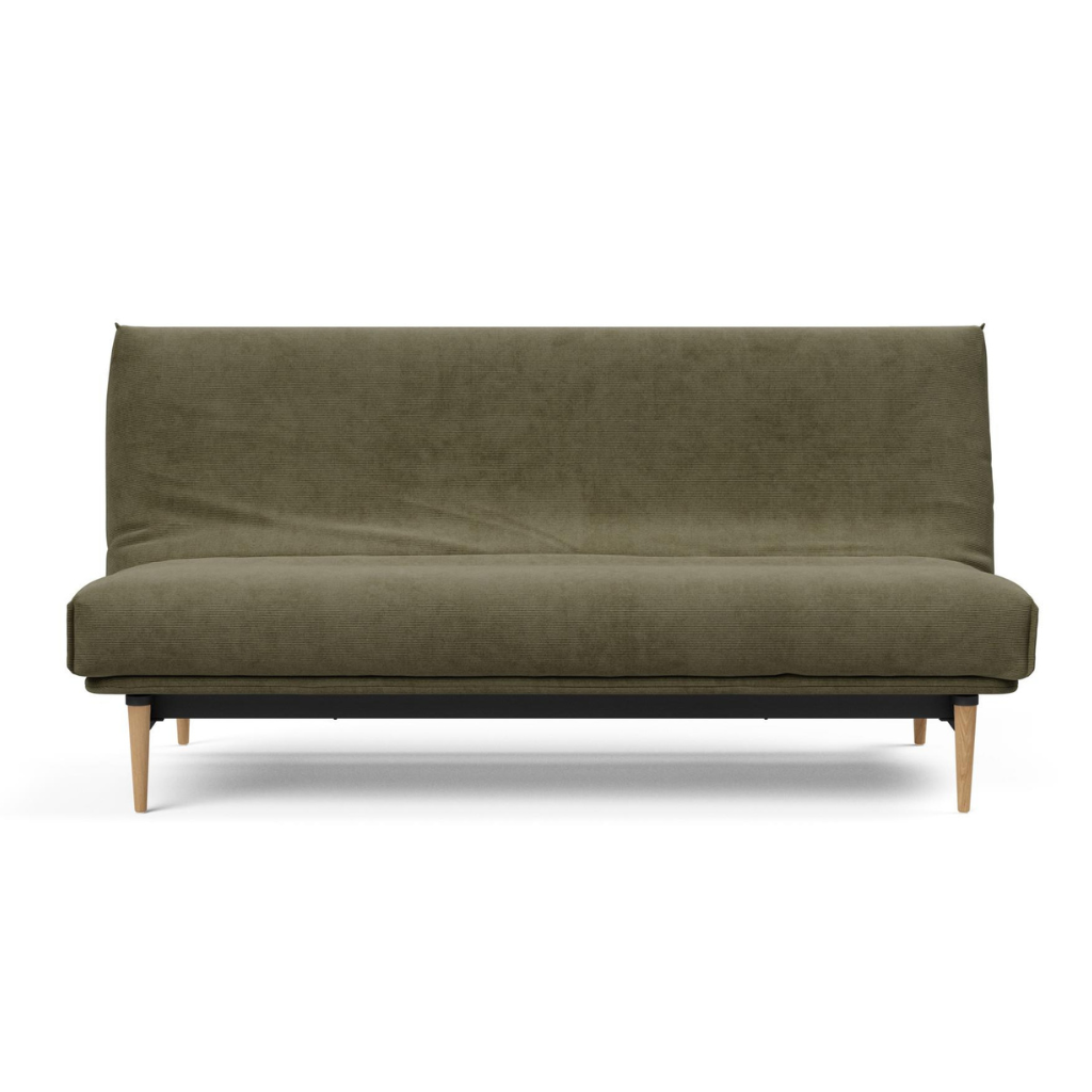 Colpus vuodesohva irtopäällisillä, kangas Cordufine Pine Green. Kuvassa sohvan patjan päälle on puettu Nordic irtopäällinen.
