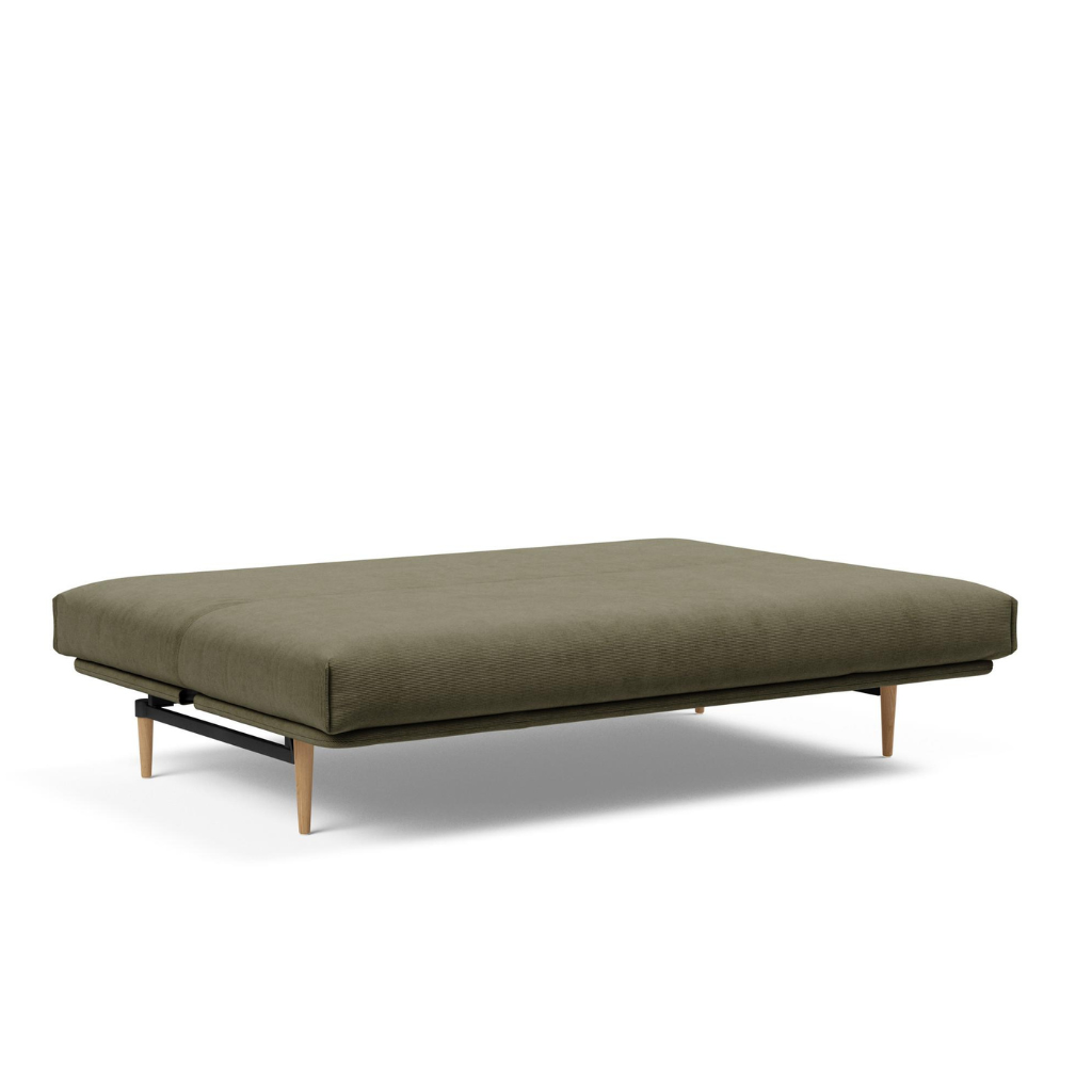 Colpus vuodesohva irtopäällisillä, kangas Cordufine Pine Green. Kuvassa sohvan patjan päälle on puettu Nordic irtopäällinen.