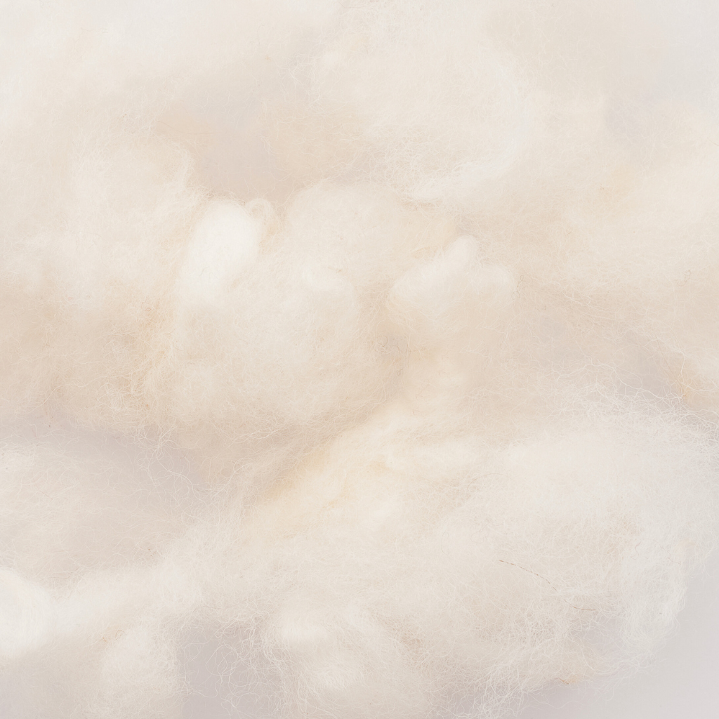 Top Cover Wool petauspatjan villatäytettä.