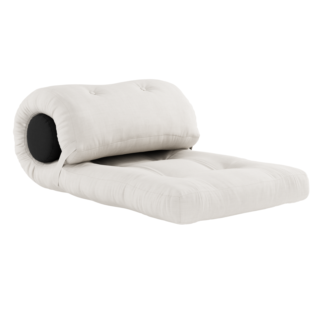 Wrap futon käärittynä putkityynyn ympärille.